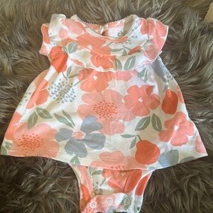 Newborn girl Floral onesie. Carter’s